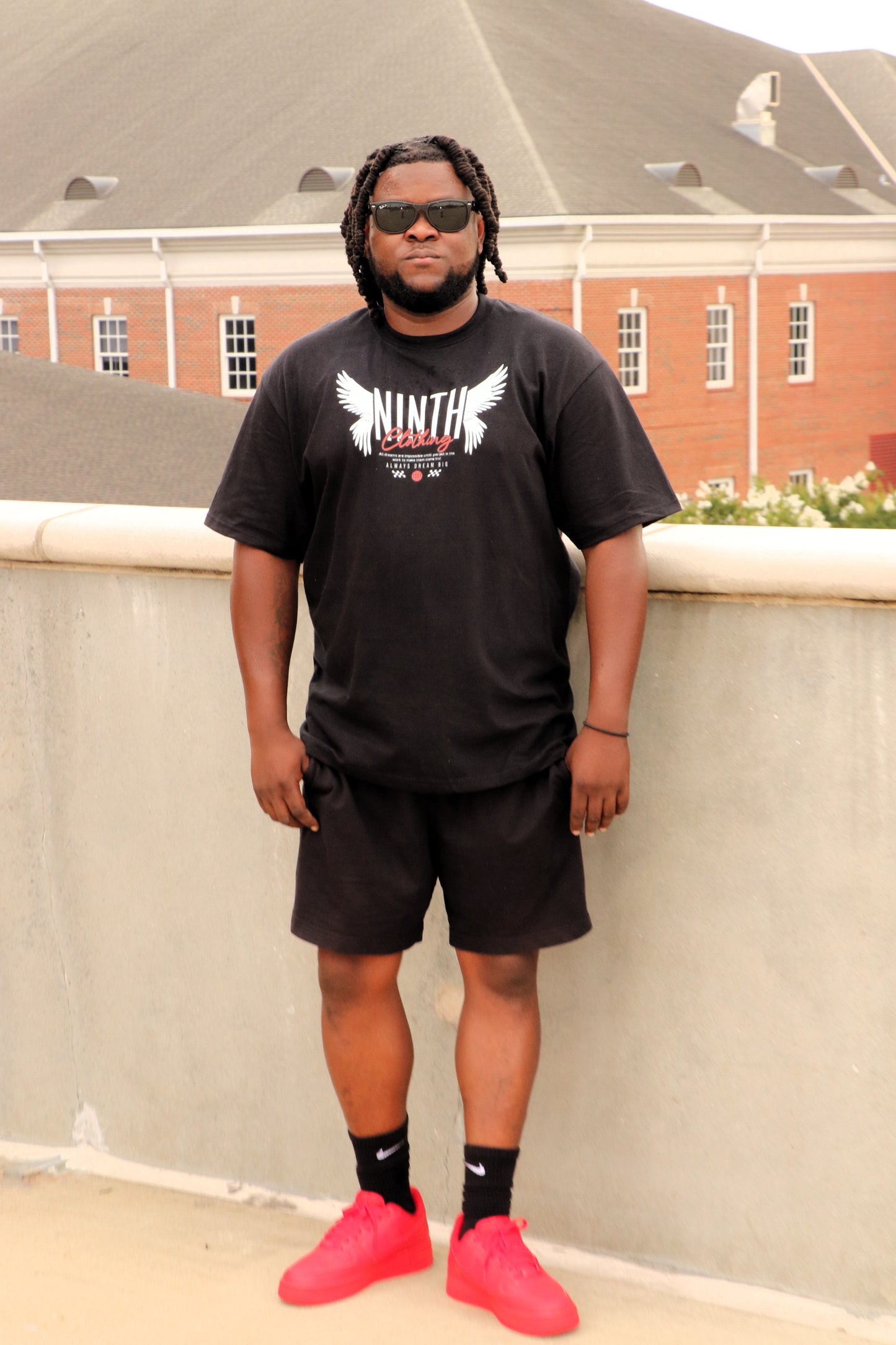 NINTH CLOTHING TEES (Model shown wearing XL top)